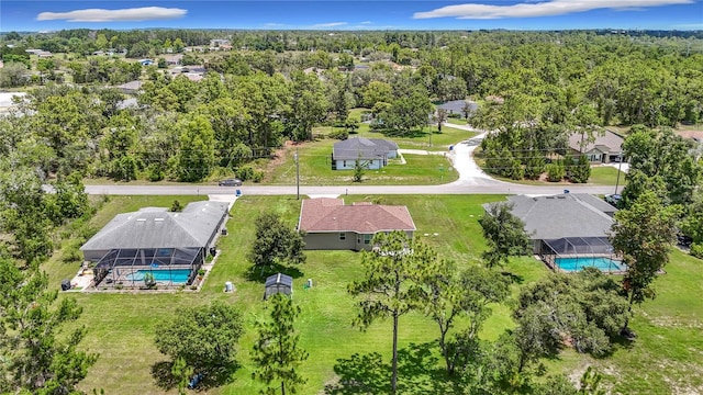 12323 House Finch, Weeki Wachee, FL 34614 - aerial perspective of suburban area featuring a pool area