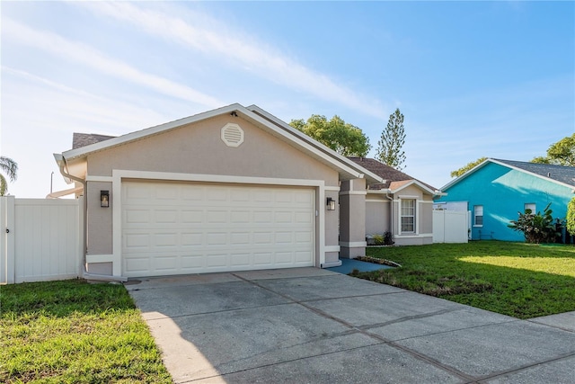 4752 Weasel Dr, New Port Richey, FL 34653 - single story home with stucco siding, driveway, and an attached garage