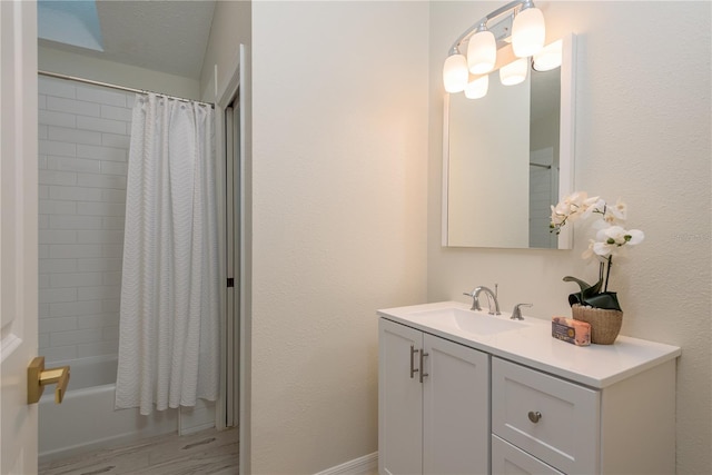 4752 Weasel Dr, New Port Richey, FL 34653 - bathroom featuring vanity, shower / bath combination with curtain, and wood finished floors
