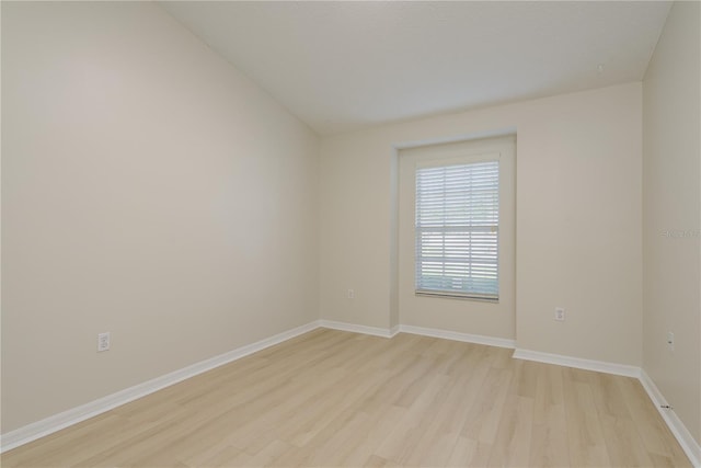 4752 Weasel Dr, New Port Richey, FL 34653 - unfurnished room with light wood-style flooring and baseboards