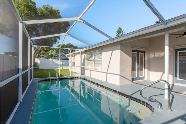 4752 Weasel Dr, New Port Richey, FL 34653 - view of swimming pool with a patio area, ceiling fan, glass enclosure, and french doors