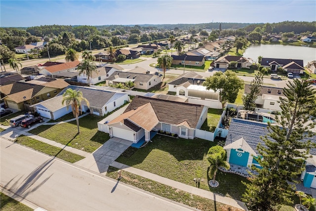 4752 Weasel Dr, New Port Richey, FL 34653 - aerial perspective of suburban area with a large body of water