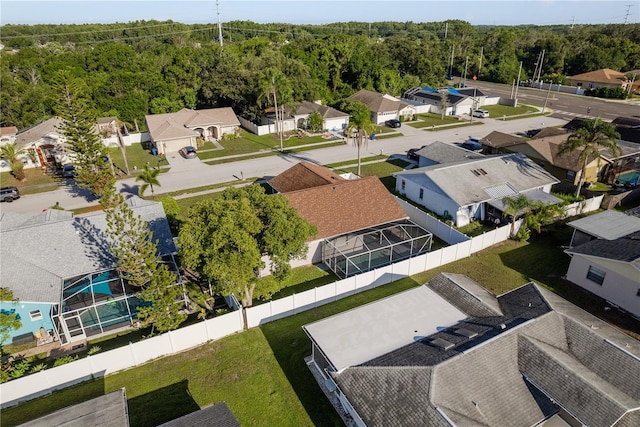 4752 Weasel Dr, New Port Richey, FL 34653 - aerial perspective of suburban area featuring a heavily wooded area