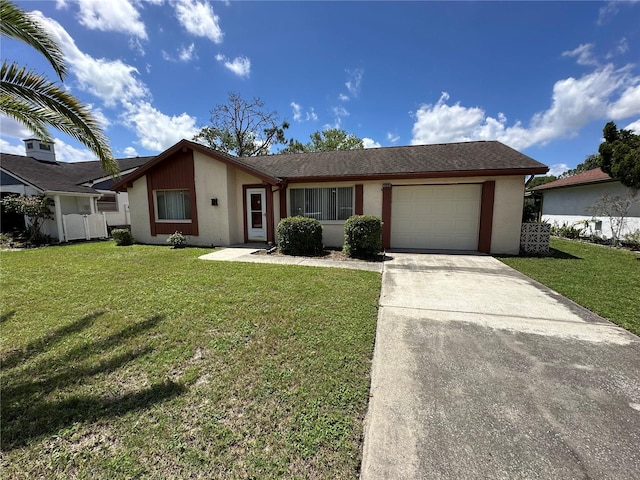 8312 Split Rail Ln, Hudson, FL 34667 - view of front of home with a garage, concrete driveway, and stucco siding