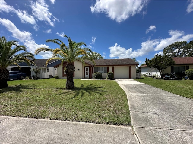 8312 Split Rail Ln, Hudson, FL 34667 - single story home with an attached garage, concrete driveway, a front lawn, and stucco siding