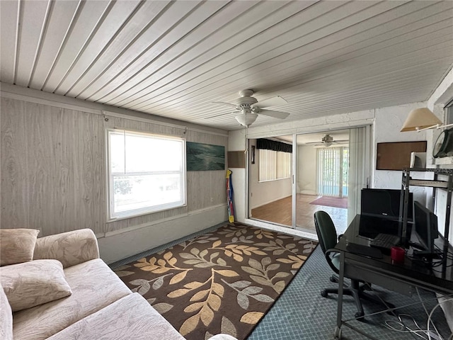 8312 Split Rail Ln, Hudson, FL 34667 - carpeted office featuring a ceiling fan, wood walls, and wood ceiling