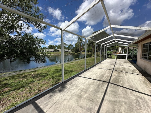 8312 Split Rail Ln, Hudson, FL 34667 - unfurnished sunroom featuring a water view and lofted ceiling