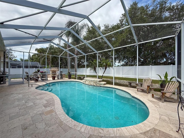 2326 Mountain Ash Way, New Port Richey, FL 34655 - view of pool with a patio, a fenced backyard, and glass enclosure
