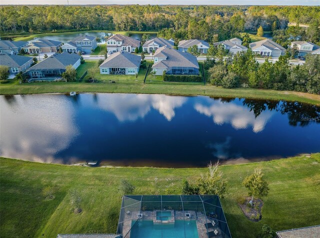 4197 Glade Wood Loop, New Port Richey, FL 34655 - aerial view of residential area with a large body of water