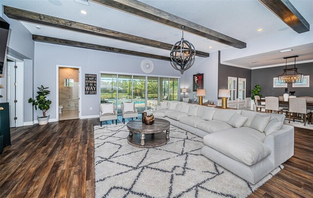 4197 Glade Wood Loop, New Port Richey, FL 34655 - living area with a chandelier, wood finished floors, beamed ceiling, plenty of natural light, and recessed lighting