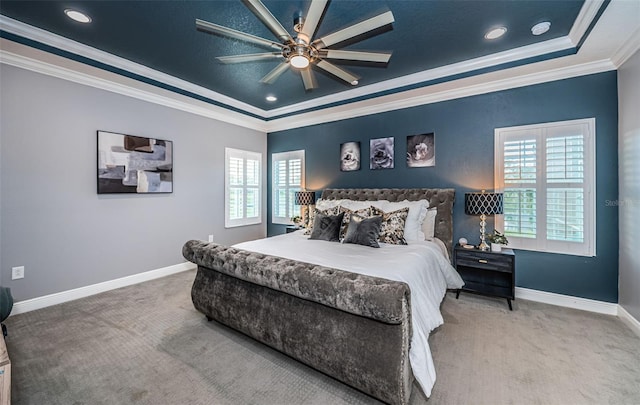 4197 Glade Wood Loop, New Port Richey, FL 34655 - carpeted bedroom with a raised ceiling, ornamental molding, multiple windows, recessed lighting, and a ceiling fan
