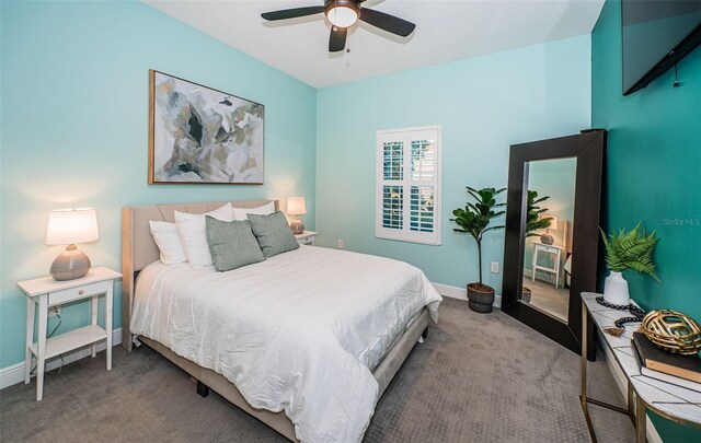 4197 Glade Wood Loop, New Port Richey, FL 34655 - bedroom with carpet and a ceiling fan