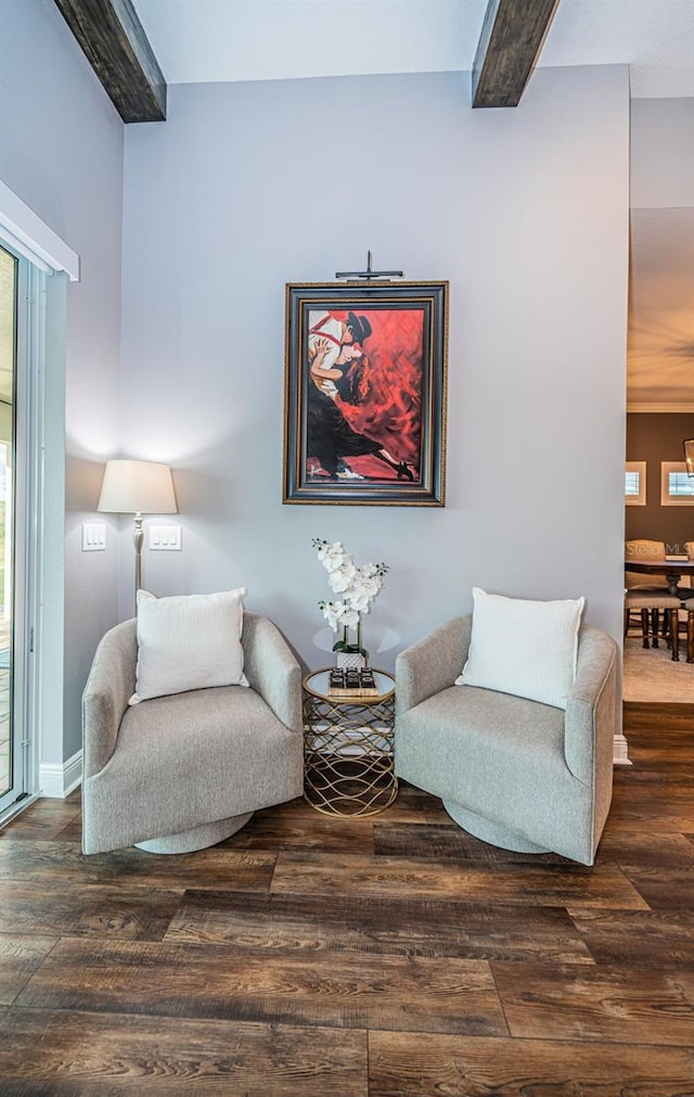 4197 Glade Wood Loop, New Port Richey, FL 34655 - sitting room featuring wood finished floors and beamed ceiling
