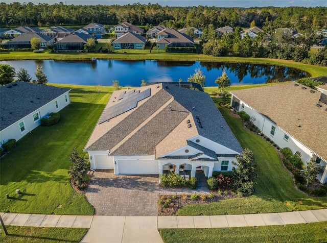 4197 Glade Wood Loop, New Port Richey, FL 34655 - aerial perspective of suburban area featuring a large body of water