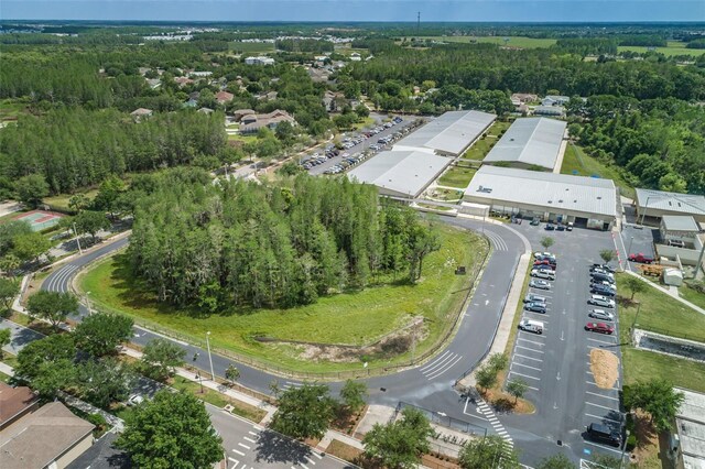 4197 Glade Wood Loop, New Port Richey, FL 34655 - aerial overview of property's location featuring a heavily wooded area