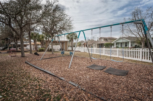 4197 Glade Wood Loop, New Port Richey, FL 34655 - communal playground with a residential view
