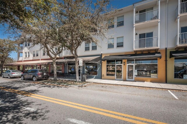 4197 Glade Wood Loop, New Port Richey, FL 34655 - view of building exterior with covered parking