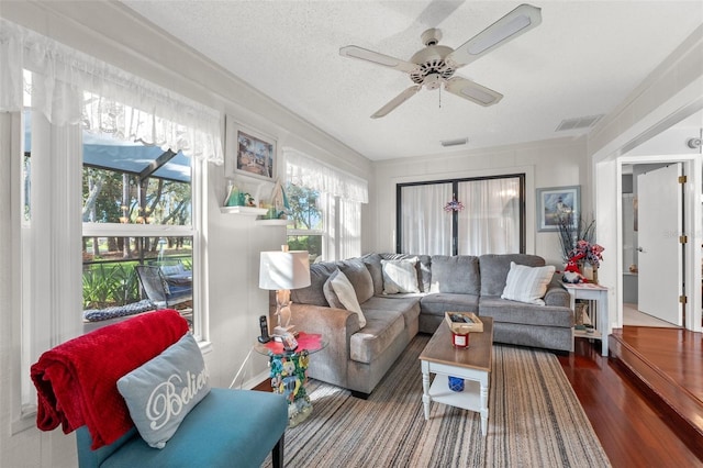 2342 Countryside Dr, Spring Hill, FL 34606 - living room with a ceiling fan, plenty of natural light, and wood finished floors