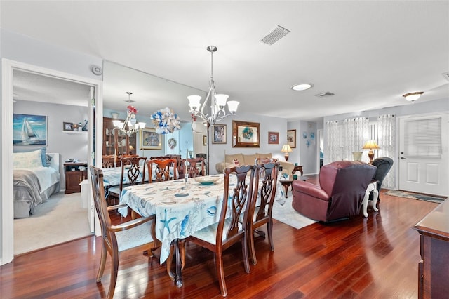 2342 Countryside Dr, Spring Hill, FL 34606 - dining room with a chandelier and wood finished floors