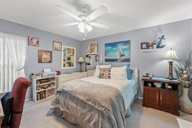2342 Countryside Dr, Spring Hill, FL 34606 - bedroom with light colored carpet, a textured ceiling, and a ceiling fan