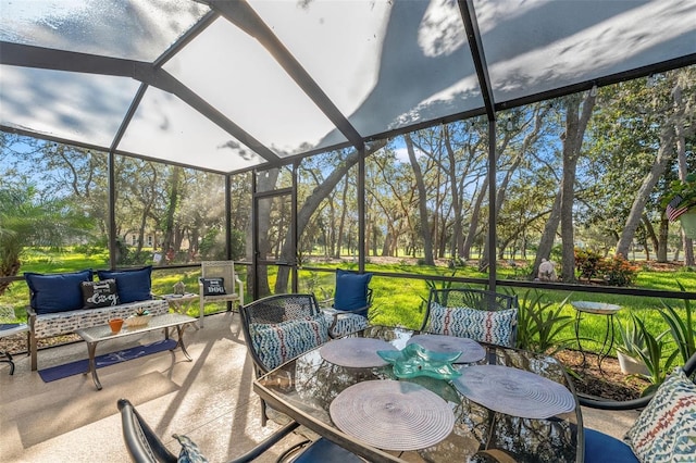 2342 Countryside Dr, Spring Hill, FL 34606 - sunroom with outdoor lounge area and view of wooded area