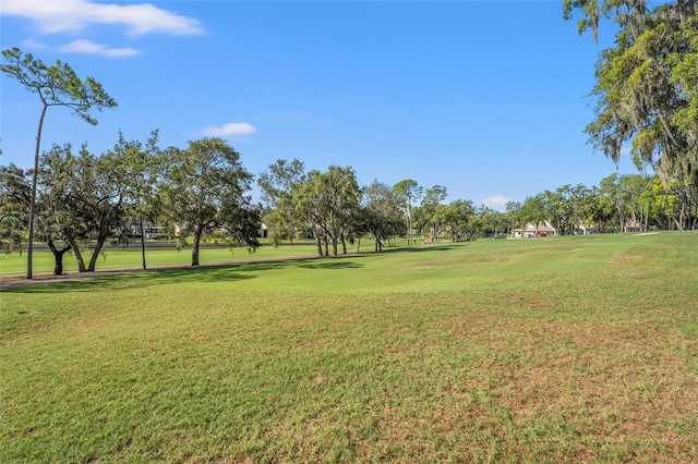 2342 Countryside Dr, Spring Hill, FL 34606 - view of community featuring a lawn and view of golf course