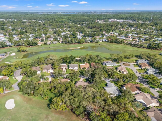 2342 Countryside Dr, Spring Hill, FL 34606 - aerial overview of property's location with nearby suburban area and a nearby body of water
