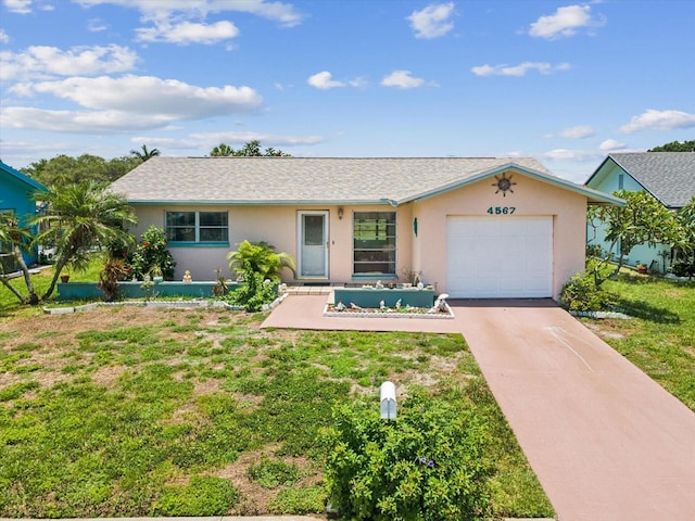 4567 Great Lakes Dr S, Clearwater, FL 33762 - ranch-style house featuring stucco siding, an attached garage, driveway, and a front yard