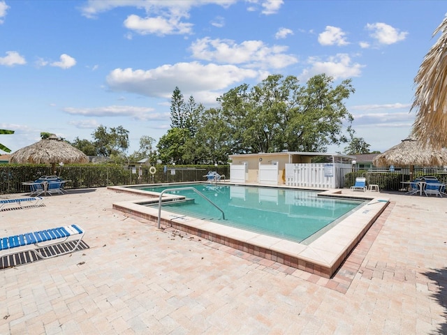 4567 Great Lakes Dr S, Clearwater, FL 33762 - community pool featuring a patio