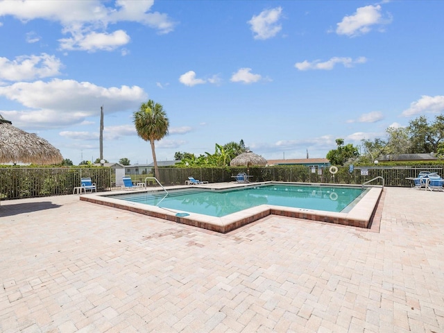 4567 Great Lakes Dr S, Clearwater, FL 33762 - community pool featuring a patio area