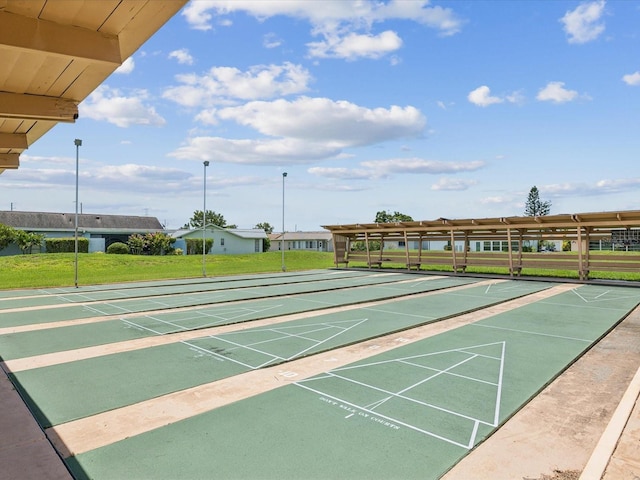 4567 Great Lakes Dr S, Clearwater, FL 33762 - surrounding community with shuffleboard and a yard