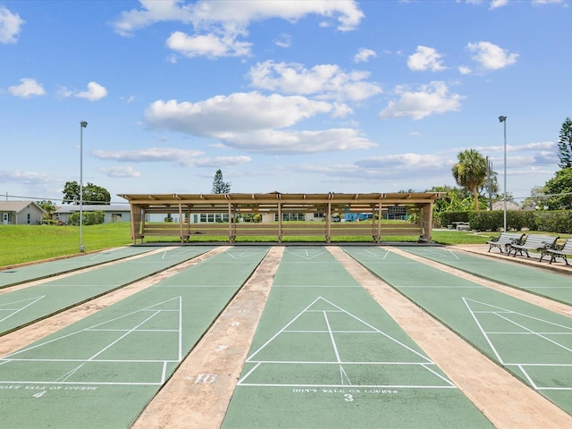 4567 Great Lakes Dr S, Clearwater, FL 33762 - view of home's community with a lawn and shuffleboard