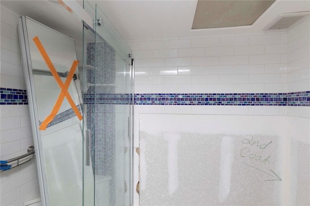 4754 Marine Pkwy Unit 103, New Port Richey, FL 34652 - full bath featuring a shower stall and tile walls