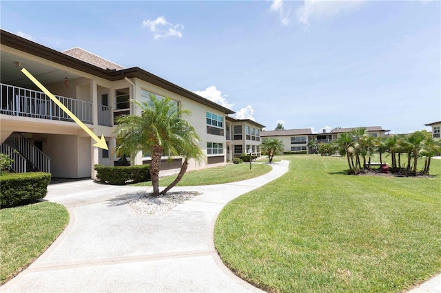 4754 Marine Pkwy Unit 103, New Port Richey, FL 34652 - surrounding community featuring a yard