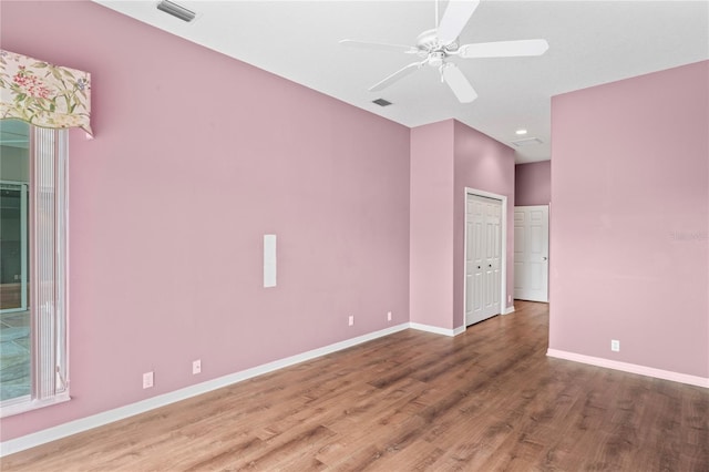 4351 Mallard Lake Dr, Spring Hill, FL 34609 - empty room with wood finished floors and ceiling fan