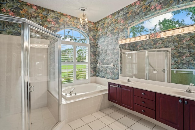 4351 Mallard Lake Dr, Spring Hill, FL 34609 - full bath featuring wallpapered walls, healthy amount of natural light, double vanity, a bath, and a stall shower