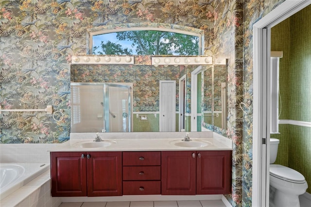 4351 Mallard Lake Dr, Spring Hill, FL 34609 - bathroom featuring wallpapered walls, double vanity, a bath, a shower stall, and plenty of natural light
