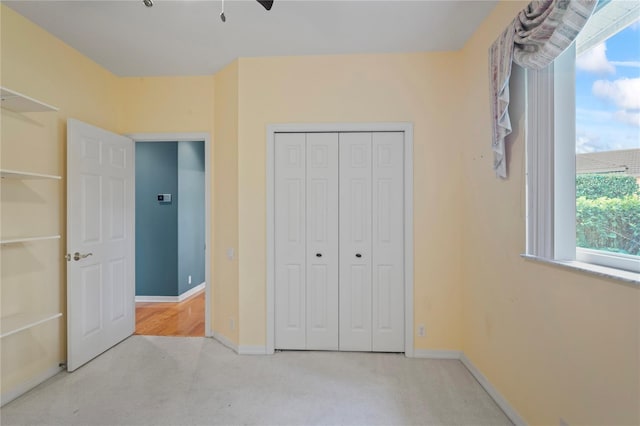 4351 Mallard Lake Dr, Spring Hill, FL 34609 - unfurnished bedroom with carpet floors and a closet