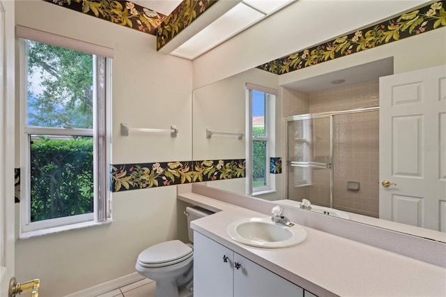 4351 Mallard Lake Dr, Spring Hill, FL 34609 - bathroom featuring a stall shower, vanity, and tile patterned flooring