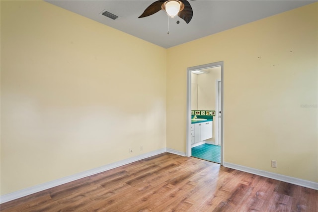 4351 Mallard Lake Dr, Spring Hill, FL 34609 - unfurnished room featuring ceiling fan and wood finished floors