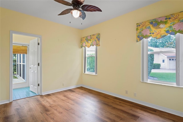 4351 Mallard Lake Dr, Spring Hill, FL 34609 - unfurnished room with wood finished floors and a ceiling fan