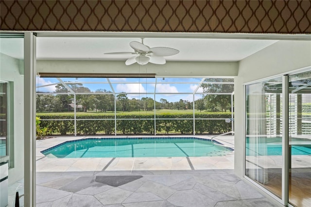 4351 Mallard Lake Dr, Spring Hill, FL 34609 - view of swimming pool featuring a patio area, glass enclosure, and a ceiling fan