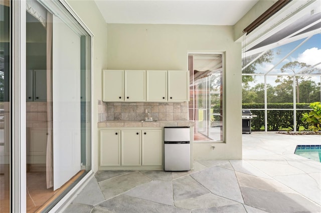 4351 Mallard Lake Dr, Spring Hill, FL 34609 - unfurnished sunroom with healthy amount of natural light