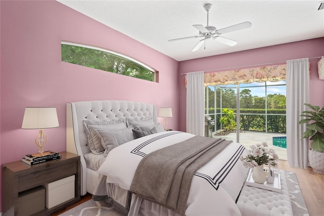 4351 Mallard Lake Dr, Spring Hill, FL 34609 - bedroom with wood finished floors and a ceiling fan