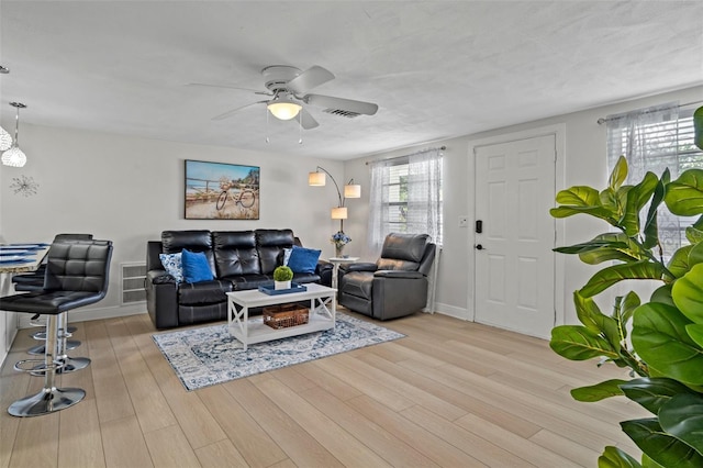6144 Glenwood Dr, New Port Richey, FL 34653 - living room featuring ceiling fan and wood finished floors
