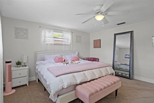 6144 Glenwood Dr, New Port Richey, FL 34653 - bedroom with carpet flooring and ceiling fan