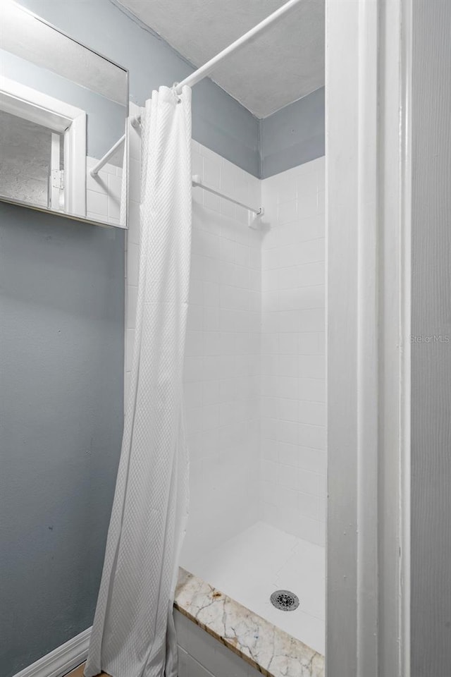 6144 Glenwood Dr, New Port Richey, FL 34653 - bathroom with a stall shower