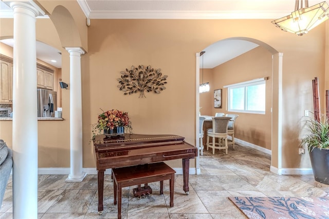 11510 Lakeview Dr, New Port Richey, FL 34654 - entrance foyer with ornate columns, arched walkways, and ornamental molding