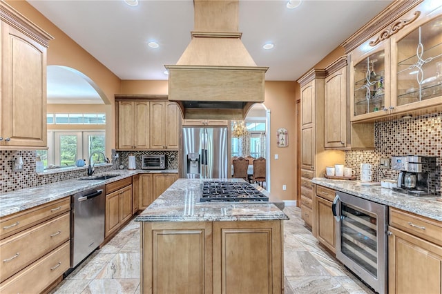 11510 Lakeview Dr, New Port Richey, FL 34654 - kitchen featuring wine cooler, appliances with stainless steel finishes, arched walkways, backsplash, and recessed lighting