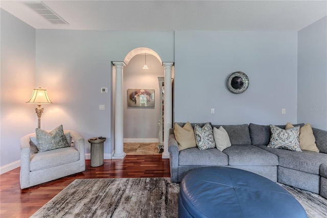 11510 Lakeview Dr, New Port Richey, FL 34654 - living area with ornate columns, wood finished floors, and arched walkways